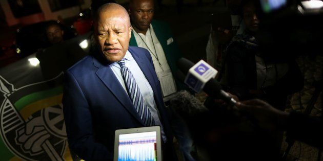 South Africa's African National Congress (ANC) party chief whip Jackson Mthembu speaks to journalists outside Parliament on August 8, 2017 in Cape Town.