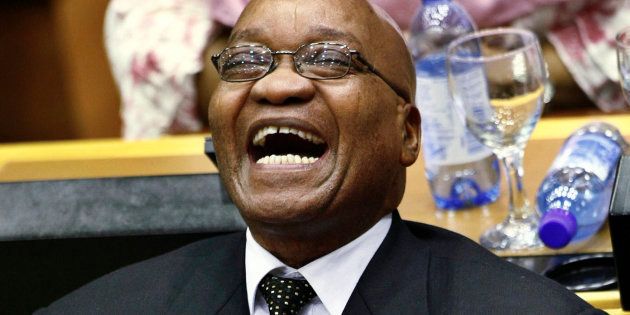 African National Congress President Jacob Zuma laughs during a special session of Parliament to formally elect the country's president in Cape Town, May 6, 2009.
