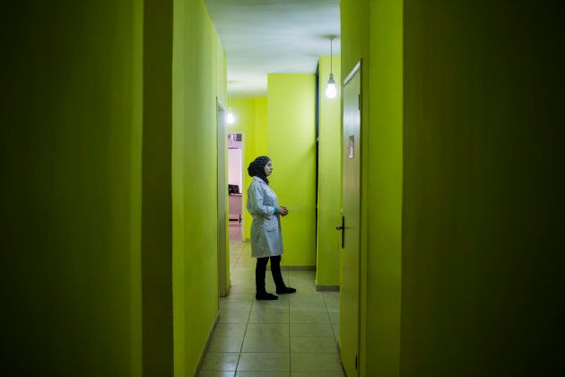 A doctor prepares to greet an expectant mother inside the new MSF maternity unit in Shatila. Most of the new residents in Shatila cannot afford to pay for medical services, so the free care provided by MSF is a vital life-line for them.