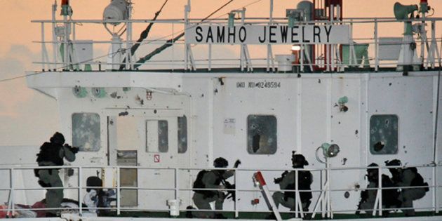 In this photo from January 2011, South Korean naval special forces rescued the crew of eight on board the Samho Jewelry vessel which had been hijacked by Somali pirates in the Arabian Sea. Five pirates were captured, eight were killed.