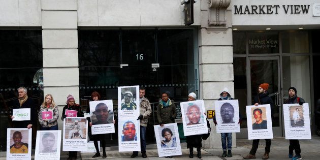 Demonstrators demand victim compensation and improved worker living conditions for Marikana miners, outside Lonmin's annual general meeting in London, Britain, on January 26, 2017.