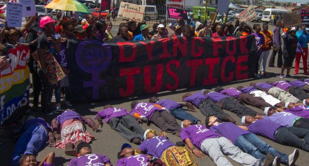 Soweto Pride 2012 participants protest against violence against lesbians with a "Dying for Justice" banner and T-shirts reading "Solidarity with women who speak out".
