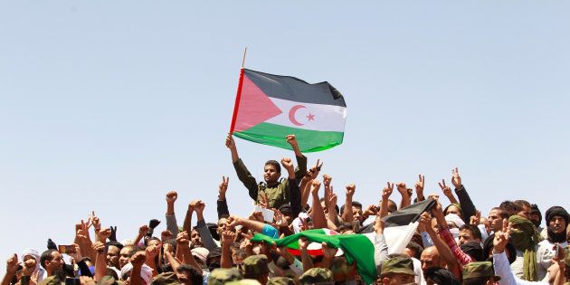 Indigenous Sahrawi people react during the funeral of Western Sahara's Polisario Front leader Mohamed Abdelaziz in Tindouf, Algeria June 3, 2016.