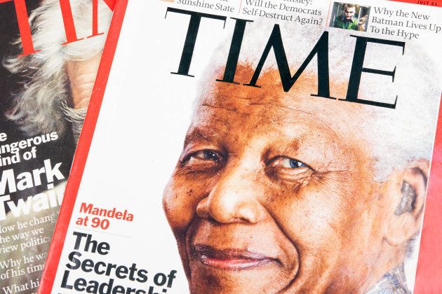 Time magazines displayed with the portrait of Nelson Mandela on the cover page.