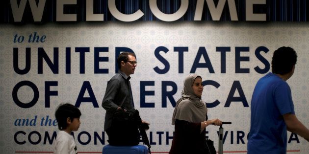 International passengers arrive at Washington Dulles International Airport in Virginia, U.S., June 26, 2017.