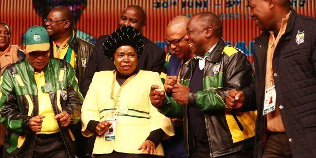 President Jacob Zuma, Nkosazana Dlamini-Zuma, Deputy President Cyril Ramaphosa and Zweli Mkhize sing and dance during the African National Congress (ANC) 5th national policy conference at the Nasrec Expo Centre on July 05, 2017.