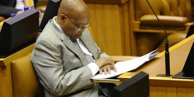 President Jacob Zuma naps during Finance Minister Pravin Gordhan's 2017 budget speech at Parliament on February 22, 2017 in Cape Town, South Africa.