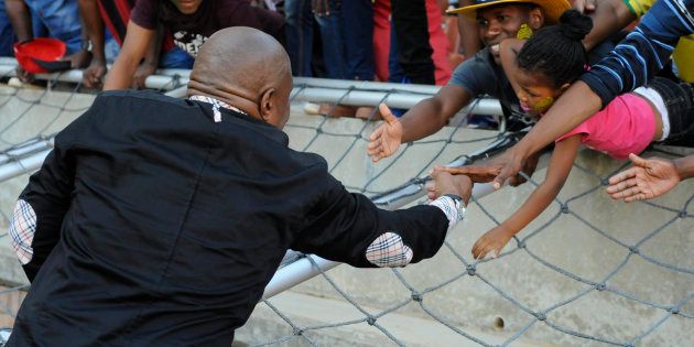 Head coach Shakes Mashaba celebrates with fans after the 2018 FIFA World Cup Qualifier match between South Africa and Senegal at Peter Mokaba Stadium on November 12, 2016 in Polokwane, South Africa. Now FIFA says that game's result was