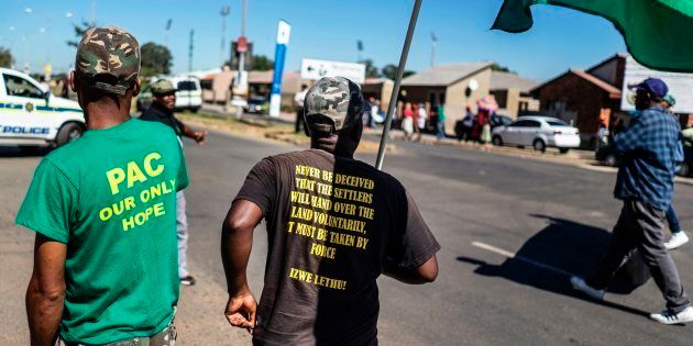 Pan African Congress (PAC) activists march as they commemorate the Sharpeville massacre anniversary at the Phelandaba in Sharpeville on March 21, 2017.