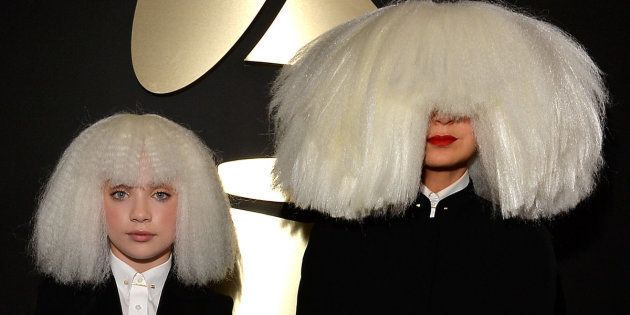 Dancer Maddie Ziegler (L) and singer/songwriter Sia attend The 57th Annual GRAMMY Awards in 2015.