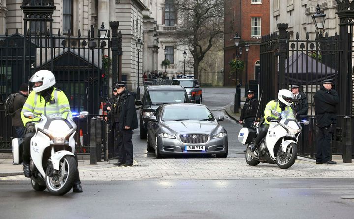 Britain's Prime Minister is driven out of Downing Street the morning after an attack by a man driving a car and weilding a knife left five people dead and dozens injured, in London, Britain, March 23, 2017. REUTERS/Neil Hall