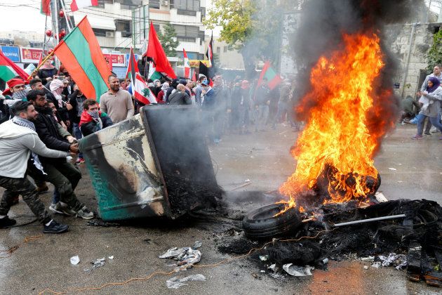 Protesters are seen near the U.S. embassy in Awkar, in Beirut, Lebanon December 10, 2017.