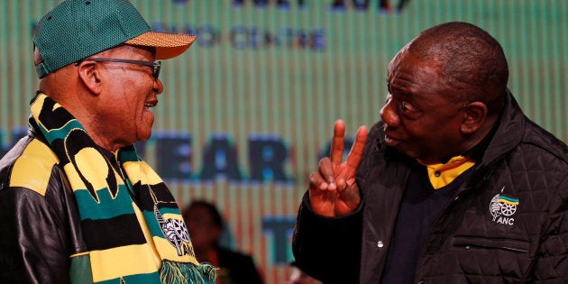 President Jacob Zuma (L) chats to his deputy Cyril Ramaphosa ahead of the African National Congress 5th National Policy Conference at the Nasrec Expo Centre in Soweto, South Africa, June 30, 2017.