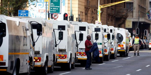 A cash-in-transit worker arrives at a nationwide protest in Johannesburg, South Africa, on June 12 2018 following a spate of deadly heists this year.