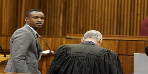 Duduzane Zuma with his lawyer Gary Mazaham at the Randburg Margistrate Court on November 4, 2014 in Johannesburg, South Africa. Zuma's was attending an inquest into a crash in which taxi passenger Phumzile Dube died after his Porsche hit the back of the taxi and the taxi overturned.