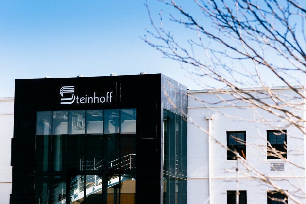 A Steinhoff International Holdings NV logo sits on display outside the company's offices in Stellenbosch, South Africa, on Wednesday, Aug. 17, 2016.