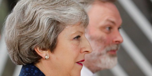 Britain's Prime Minister Theresa May and Britain's Permanent Representative to the EU Tim Barrow arrive at an European Union leaders summit in Brussels, Belgium, June 28, 2018. REUTERS/Yves Herman