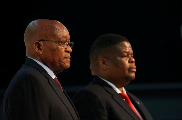 President Jacob Zuma (L) stands next to David Mahlobo, minister of energy, ahead of the Energy Indaba conference in Midrand, South Africa, December 7, 2017.