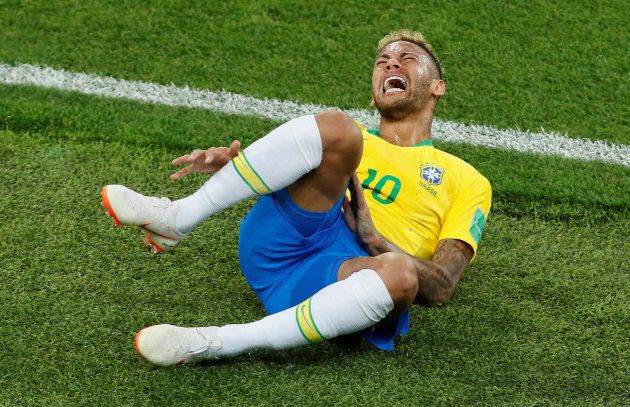 Brazil's Neymar overreacts after a foul. Serbia vs Brazil - Spartak Stadium, Moscow, Russia. June 27 2018.