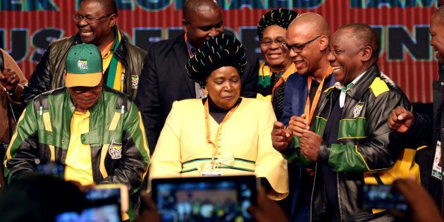 President Jacob Zuma dances with former AU Commission chairperson Nkosazana Dlamini-Zuma and South Africa's Deputy President Cyril Ramaphosa.