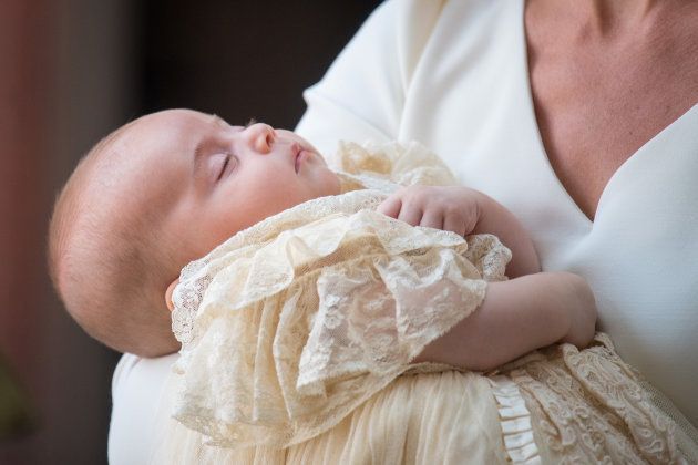 Catherine, Duchess of Cambridge, carries Prince Louis as they arrive for his christening service at the Chapel Royal, St James's Palace in London, on Monday.