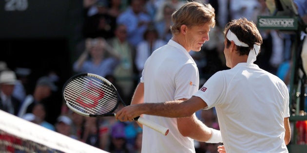 Tennis - Wimbledon - All England Lawn Tennis and Croquet Club, London, Britain - July 11, 2018. South Africa's Kevin Anderson celebrates winning his quarter-final match against Switzerland's Roger Federer.