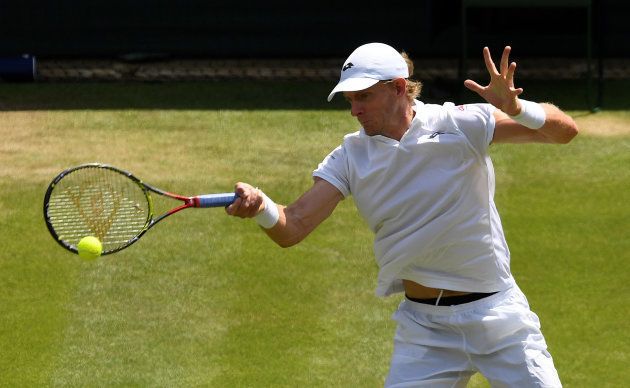 Tennis - Wimbledon - All England Lawn Tennis and Croquet Club, London, Britain - July 11, 2018 South Africa's Kevin Anderson in action during his quarter final match against Switzerland's Roger Federer.
