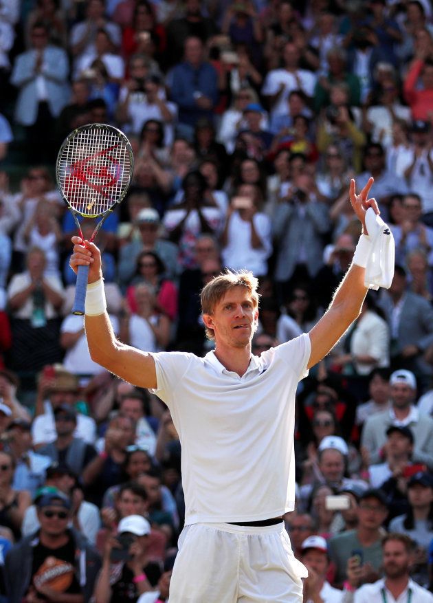 Tennis - Wimbledon - All England Lawn Tennis and Croquet Club, London, Britain - July 11, 2018. South Africa's Kevin Anderson celebrates winning his quarter final match against Switzerland's Roger Federer . REUTERS/Andrew Boyers