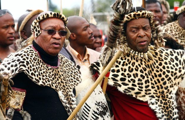 Jacob Zuma (L) joins Zulu King Goodwill Zwelithini ka Bhekuzulu (R) together with thousands of people to honour the birth of Zulu warrior and founder of the Zulu nation King Shaka at Kwadukuzu, some 90 kilometres north of Durban on September 24, 2008. Rajesh Jantilal/ AFP/Getty Images