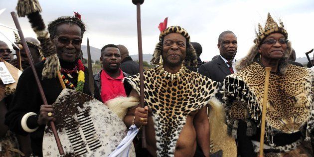 Prince Mangosuthu Buthelezi and Jacob Zuma with Zulu King Goodwill Zwelithini during one of the monarch's weddings at Ondini Sports Complex on July 26 2014, in Ulundi.