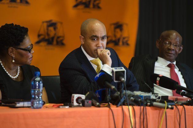South African National Prosecuting Authority director Shaun Abrahams (C) gives a press briefing on October 31, 2016 at the NPA headquarters in Pretoria.