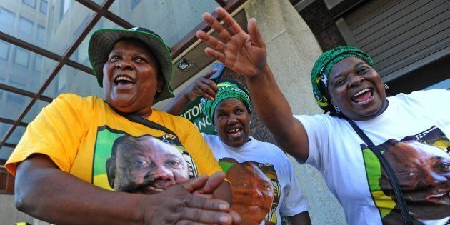 ANC members show their support for party leader and South African President Cyril Ramaphosa.