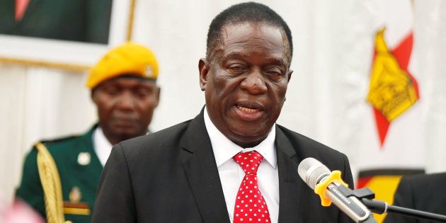 Zimbabwean President Emmerson Mnangagwa officiates at the swearing in ceremony for his cabinet at State House in Harare, Zimbabwe December 4, 2017. REUTERS/Philimon Bulawayo