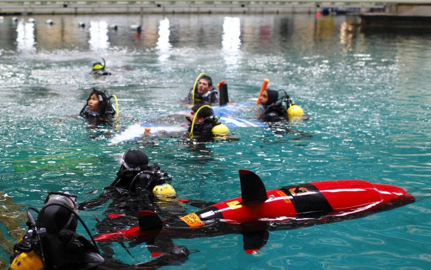 Engineering students from around the world ready their human powered submarines before racing at Qinetiq's Ocean Basin test tank in Gosport, Hampshire, U.K.