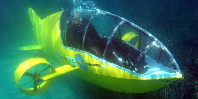 Stephane Rousson, chief designer of the Scubster submarine, a pedal-powered personal wet sub, is seen underwater during testing in Villefranche sur Mer, southeastern France, July 28 2010.