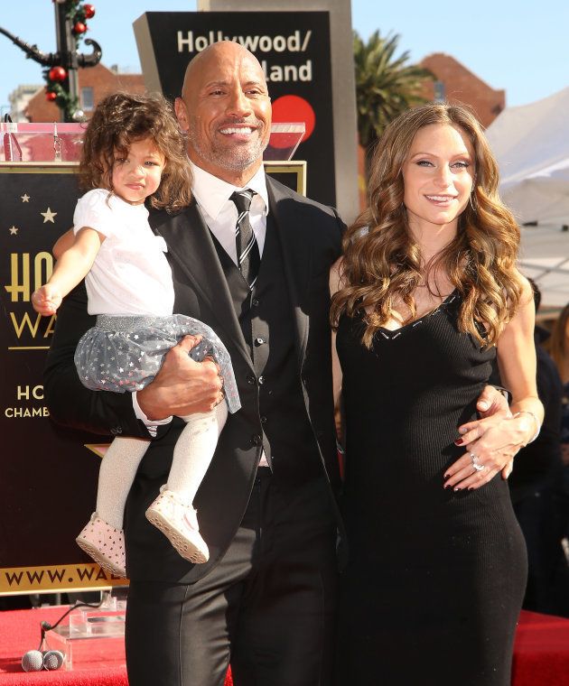 Dwayne Johnson with Lauren Hashian and their daughter Jasmine at the Hollywood Walk of Fame ceremony.