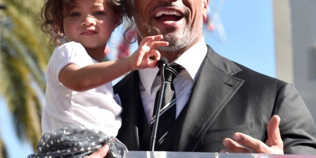 Dwayne Johnson and his daughter Jasmine at the Hollywood Walk of Fame on Dec. 13, 2017.