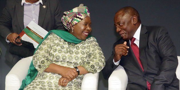 Former Head of the African Union (AU) Dr Nkosazana Dlamini Zuma (L) chats with South African Deputy President Cyril Ramaphosa.