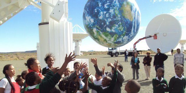 School children at the site of the KAT-7 radio telescope in Carnarvon, South Africa.