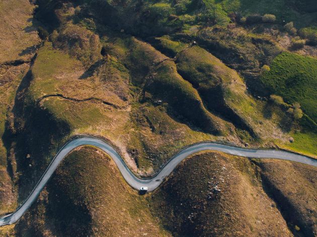 A mountain road with curves as seen from above