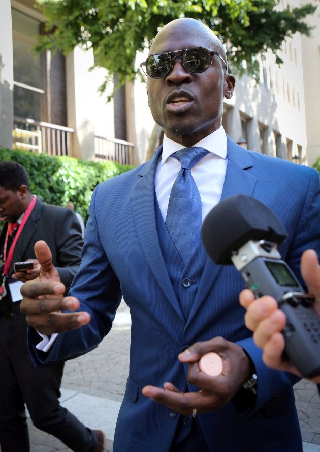 Finance Minister Malusi Gigaba speaks to members of the media after delivering his medium term budget speech in Parliament, in Cape Town, October 25, 2017. REUTERS/Sumaya Hisham