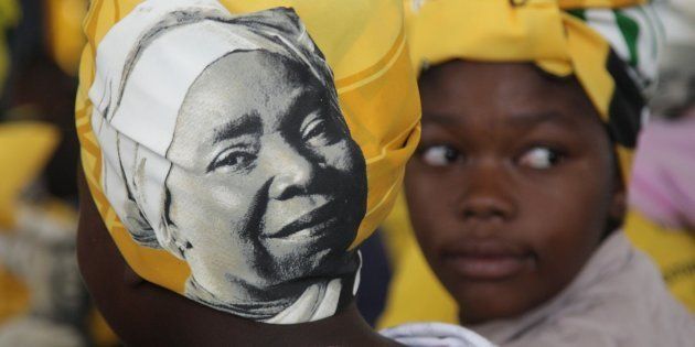 A woman is seen wearing a doek adorned with Nkosazana Dlamini-Zumas face during the prayer party organised by the Dlamini Clan in her home Bulwer on December 10, 2017 in KwaZulu-Natal.