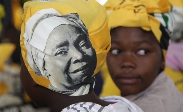 A woman is seen wearing a doek adorned with Dlamini-Zuma's likeness during a gathering on December 10, 2017 in Bulwer, KwaZulu-Natal.