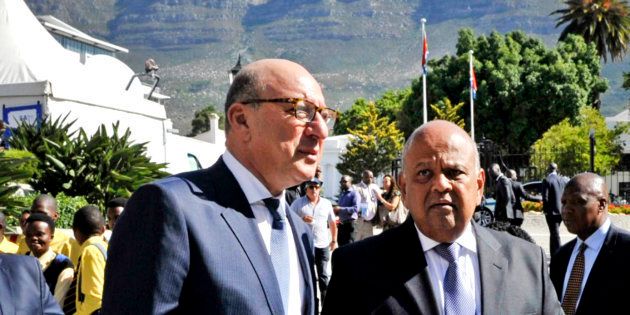 Minister of Finance Pravin Gordhan with one of his predecessors, Trevor Manuel, ahead of Gordhan's 2016 Budget Vote Speech in February 2016.