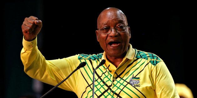 President Jacob Zuma gestures to his supporters at the 54th National Conference of the ANC at the Nasrec Expo Centre in Johannesburg.