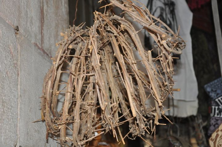 Crowns of Thorne hang outside the entrance to the Church of the Holy Sepulchre's courtyard.