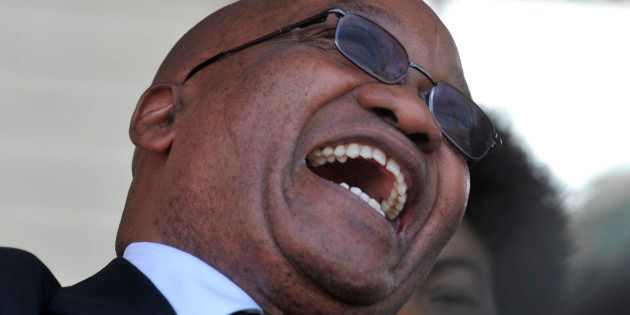 President Jacob Zuma finds something funny.
