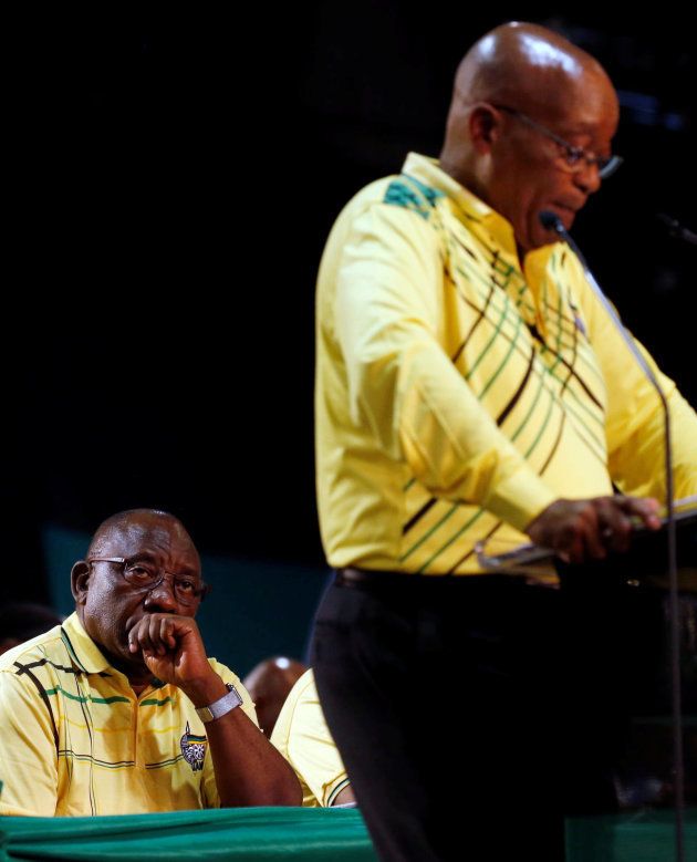 Deputy president of South Cyril Ramaphosa (L) looks on as President of South Africa Jacob Zuma addresses the 54th National Conference of the ruling African National Congress (ANC) at the Nasrec Expo Centre in Johannesburg, South Africa December 16, 2017. REUTERS/Siphiwe Sibeko