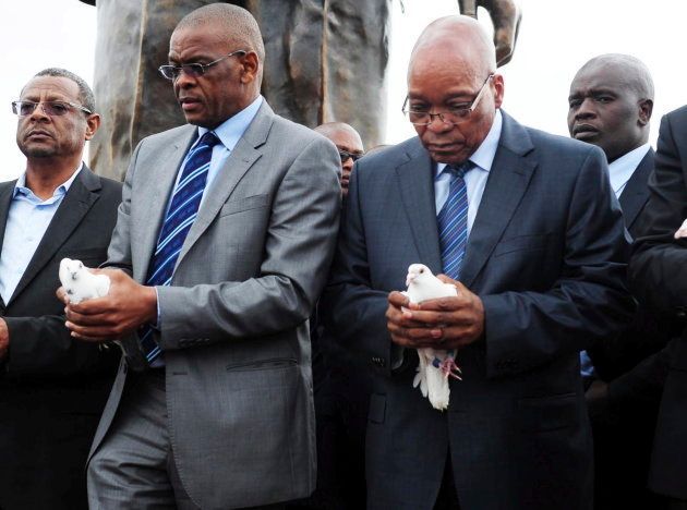 President Jacob Zuma and the premier of the Free State Ace Magashule ready to release white doves during the Nelson Mandela statue unvailing in Mangaung at Naval Hill on December 13, 2012.