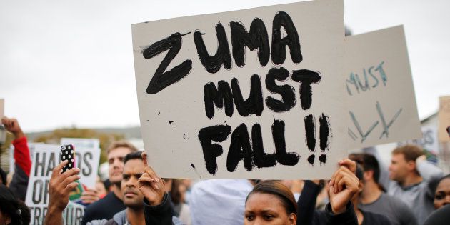 Demonstrators protest against South African President Jacob Zuma's firing of Finance Minister Pravin Gordhan, outside Parliament in Cape Town, South Africa, March 31, 2017. REUTERS/Mike Hutchings